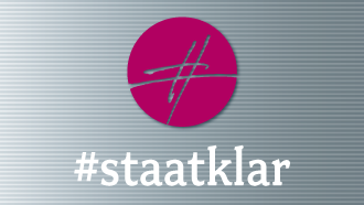 Ein pinkes Rautensymbol mit dem Untertitel "staatklar"
