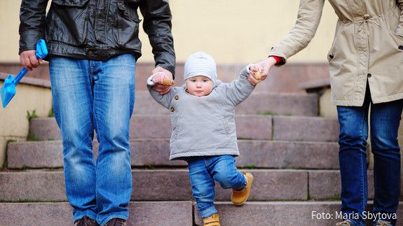 outdoors, girl, people, person, young, park, love, parent, father, family, mother, lifestyle, woman, day, man, boy, city, town, urban, support, happy, holding, hands, walking, child, steps, stairs, aged, playing, development, little, foot, son, european, jeans, three, kid, baby, together, parenting, parenthood, legs, offspring, toddler, cone, grandson, teaching, grandparents, stride, going
